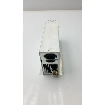 Back view of silver metallic x power 40-52154-001 rev e power supply with black ac socket and brass output connector compatible equipment connection