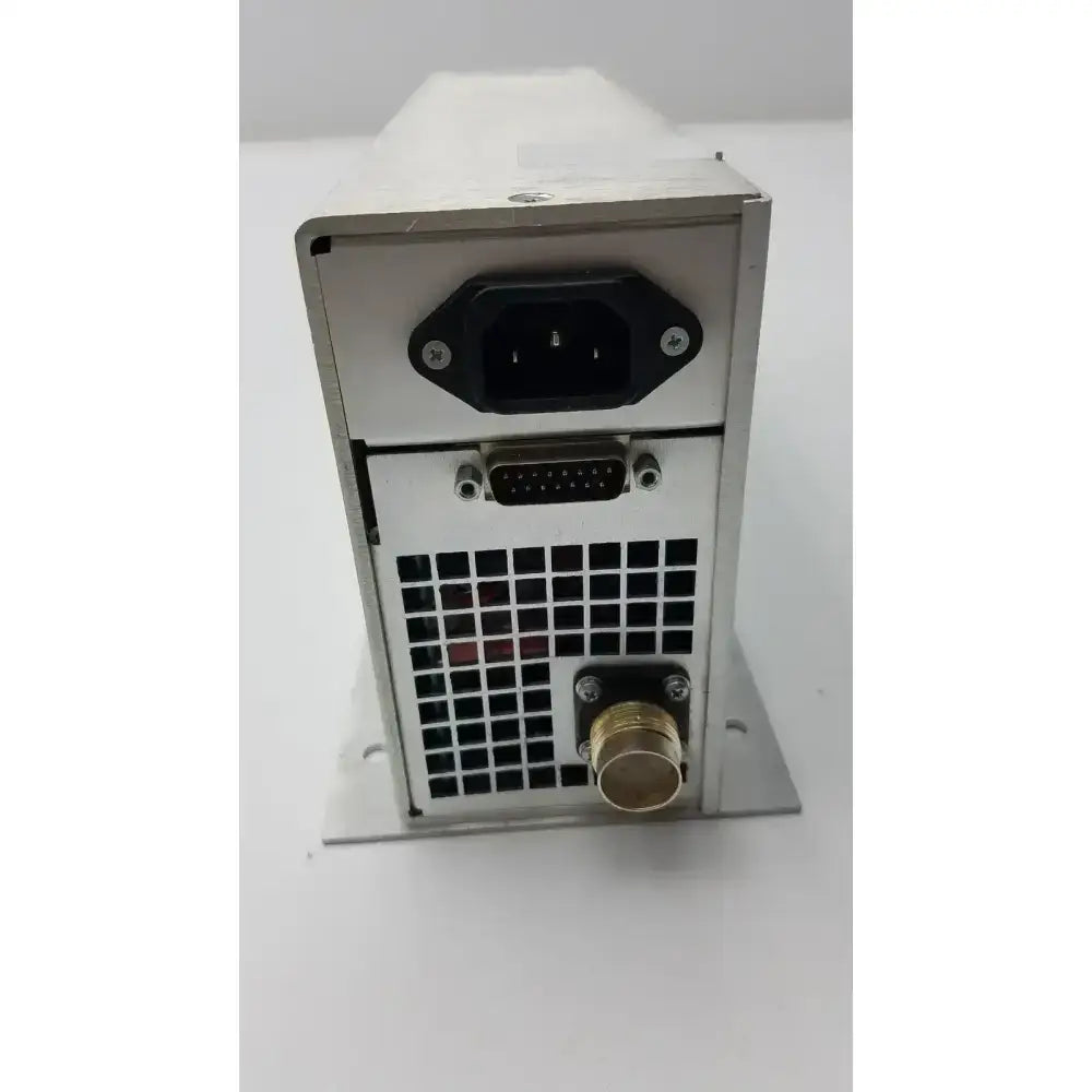 Backside of silver metallic x power 40-52154-001 rev e power supply with black iec connector, d-sub interface, and gold port for compatible equipment connection