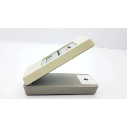 Beige plastic digital caliper with small screen and buttons for precise measurement in x-rite rmi densitometer ac5-377