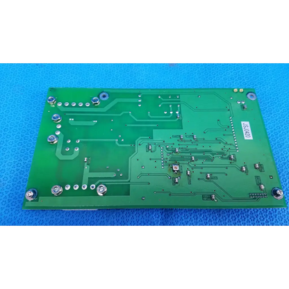 Green rectangular power circuit board with silver components and mounting screws for retinal camera topcon trc-nw6sf