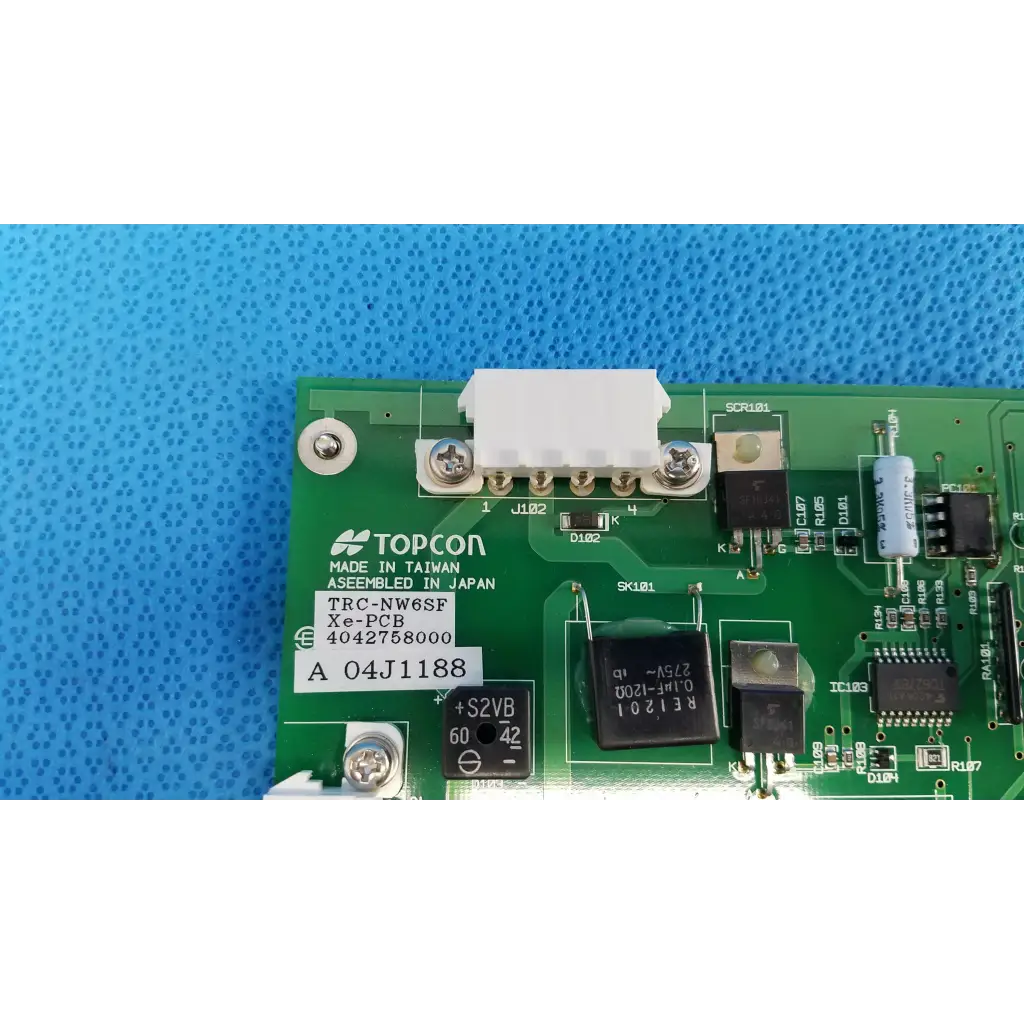 Green topcon xe-pcb power circuit board with black and silver components for retinal camera trc-nw6sf