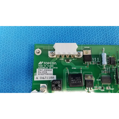 Green topcon xe-pcb power circuit board with black and silver components for retinal camera trc-nw6sf