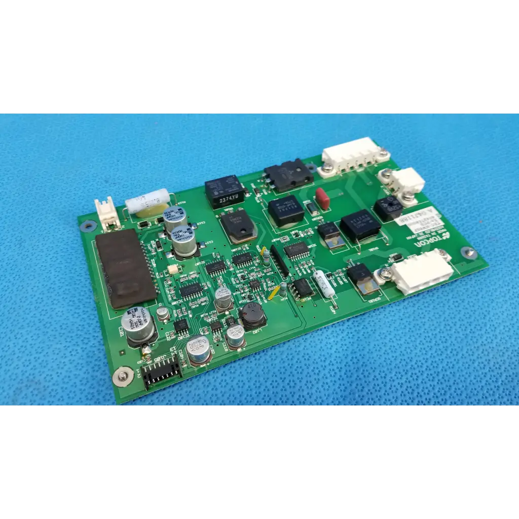 Green printed circuit power board with electronic components and white connectors for Topcon retinal camera