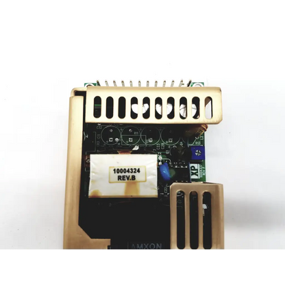 Gold-colored metal heat sink on black circuit board with components in xp power ecm100us24 open frame ac dc unit