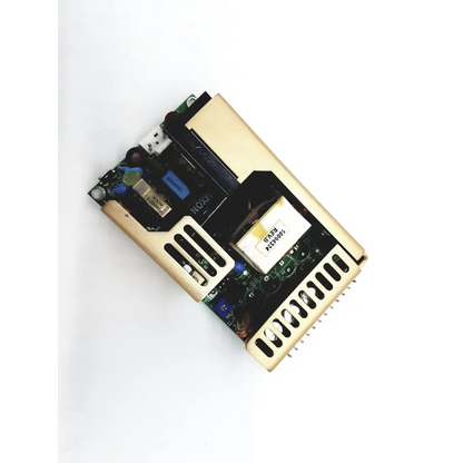 Gold-colored metal ac/dc open frame power supply unit with visible circuit board xp power ecm100us24