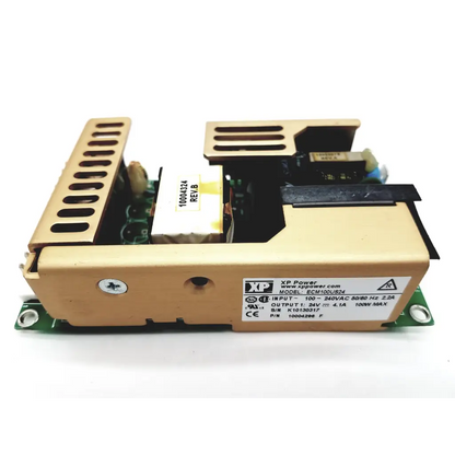 Beige xp power ecm100us24 open frame power supply with gold heat sink and black internal components