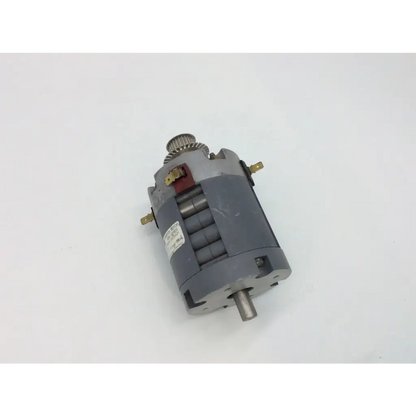 Gray electric motor with metallic shaft gear red switch and brass terminals by yaskawa electric corp minertia typ