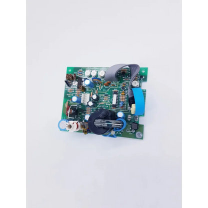 Green z-axis 320154001 rev a pcb with capacitors resistors and black rotary knob for spacelabs mpc860 nibp assembly board