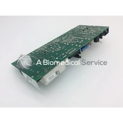 Green circuit board rev b power board z-axis with silver components and white cylindrical sensor attached