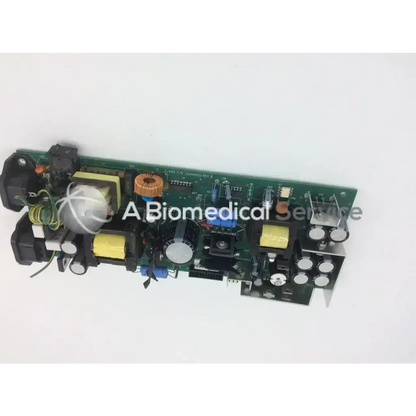 Green circuit board power board z-axis 320468000 rev b with capacitors resistors and coils for electronic use