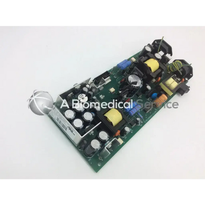 Green printed circuit board with black yellow and blue capacitors resistors and connectors for rev b power board z-axis