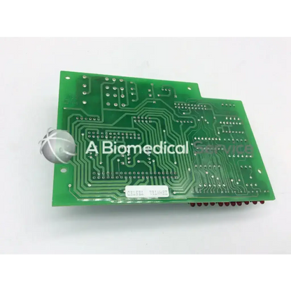 Green rectangular zehntel f-758543-51 board with silver soldered components and a white label on circuit board surface