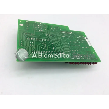 Green printed circuit board with silver solder points and red connectors on the edge zehntel f-758543-51 board
