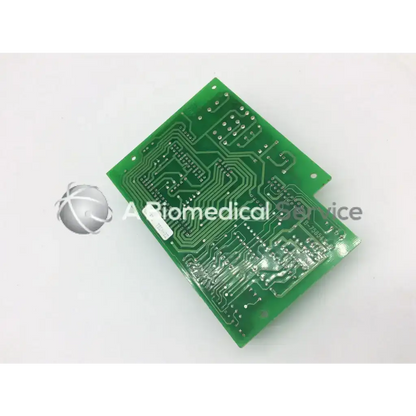 Green rectangular circuit board with silver conductive traces and solder points zehntel f-758543-51 board