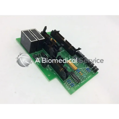 Green printed circuit board with black connectors and rectangular relay module on the zehntel f-758543-51 board