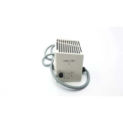 Beige zeiss hbo 100 industrial power supply unit with gray coiled cable and vented top for mercury burner lamp fluorescence