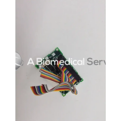 Green circuit board with rainbow-colored ribbon cables attached for zeiss humphrey system pcba4950revb2 bbcd1-7 use
