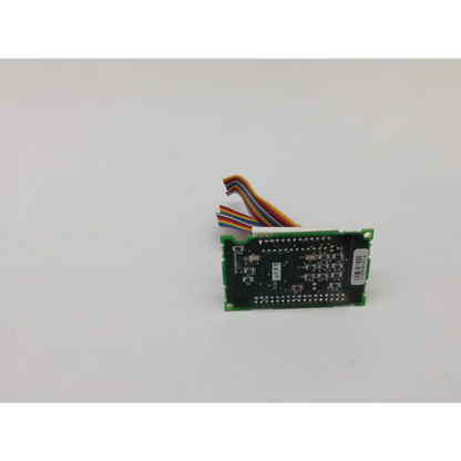 Green circuit board with black components and multicolored ribbon cable for zeiss humphrey rev b pcbf 49499 rev b bbcd1-7