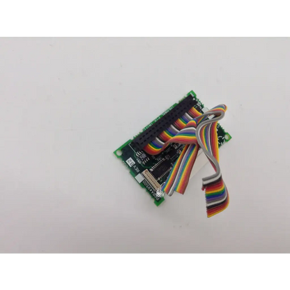 Green circuit board with rainbow ribbon cables and black connectors in zeiss humphrey rev b pcbf 49499 rev b bbcd1-7