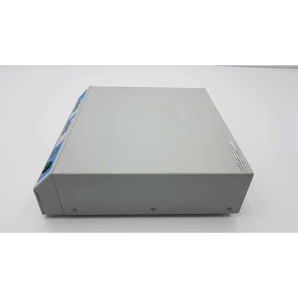 Gray rectangular zeiss medilive camera control unit with blue and white label on the side for camera control use