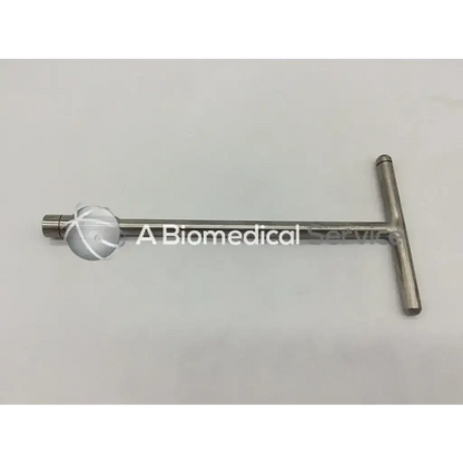 Silver t-shaped lag screw extractor with cylindrical handle and threaded end for compression lag screws by Zimmer