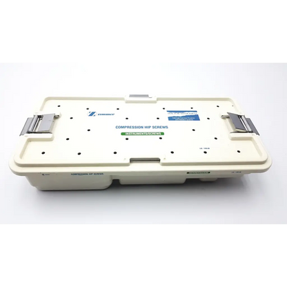 Cream-colored plastic zimmer compression hip screws kit tray with silver metal latches and printed labels