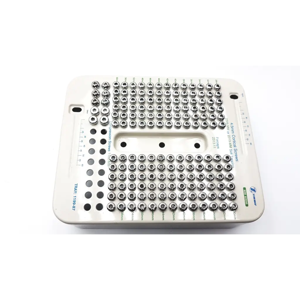 White plastic tray with organized metallic 4.5mm compression hip screws in various sizes from zimmer hip screws kit