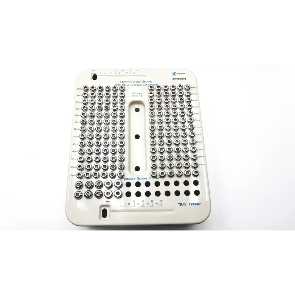 White plastic tray with organized rows of metallic 4.5mm cortical compression hip screws in zimmer hip screws kit