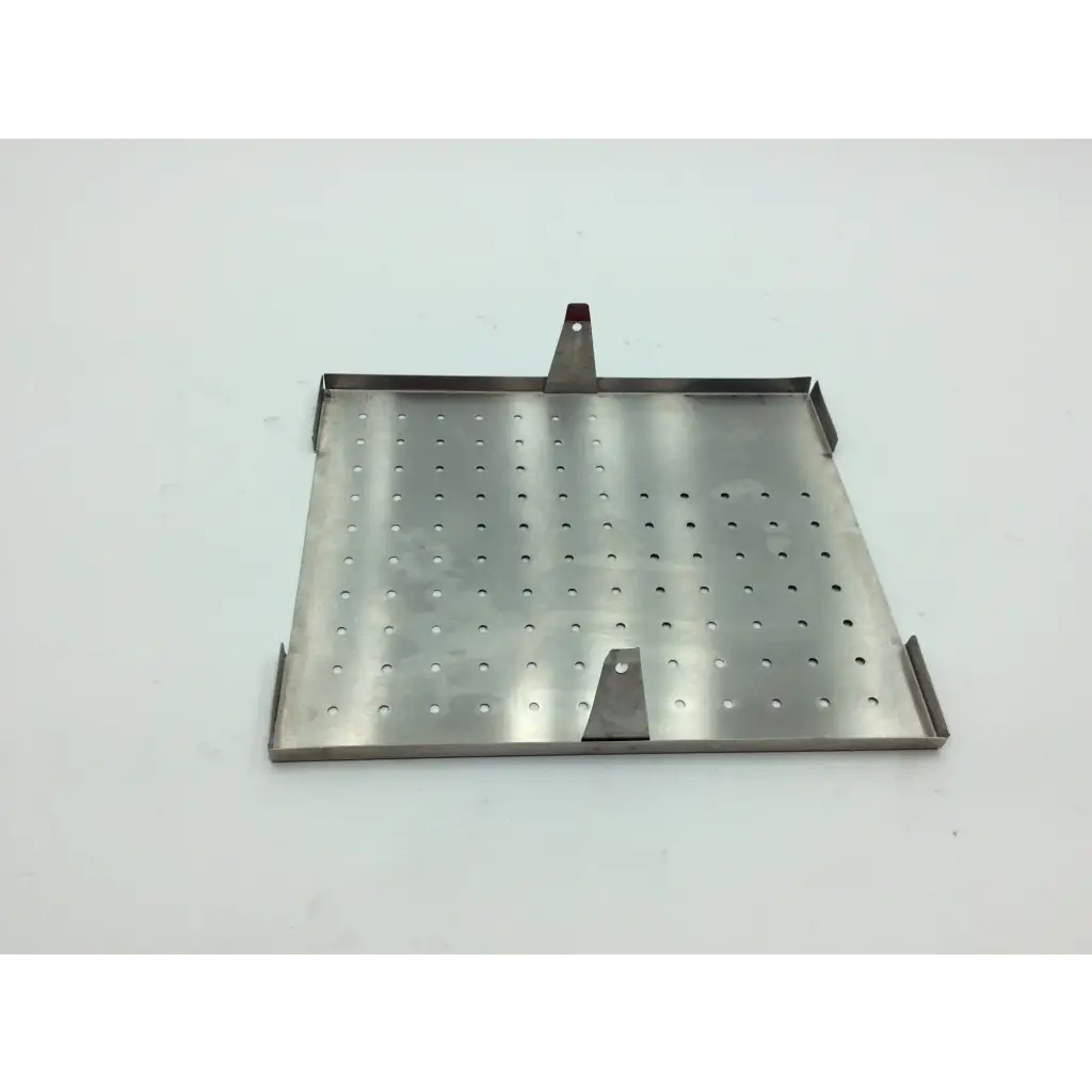 Stainless steel perforated tray with red-tipped handle and triangular cutouts for zimmer hall autoclave case aci-71