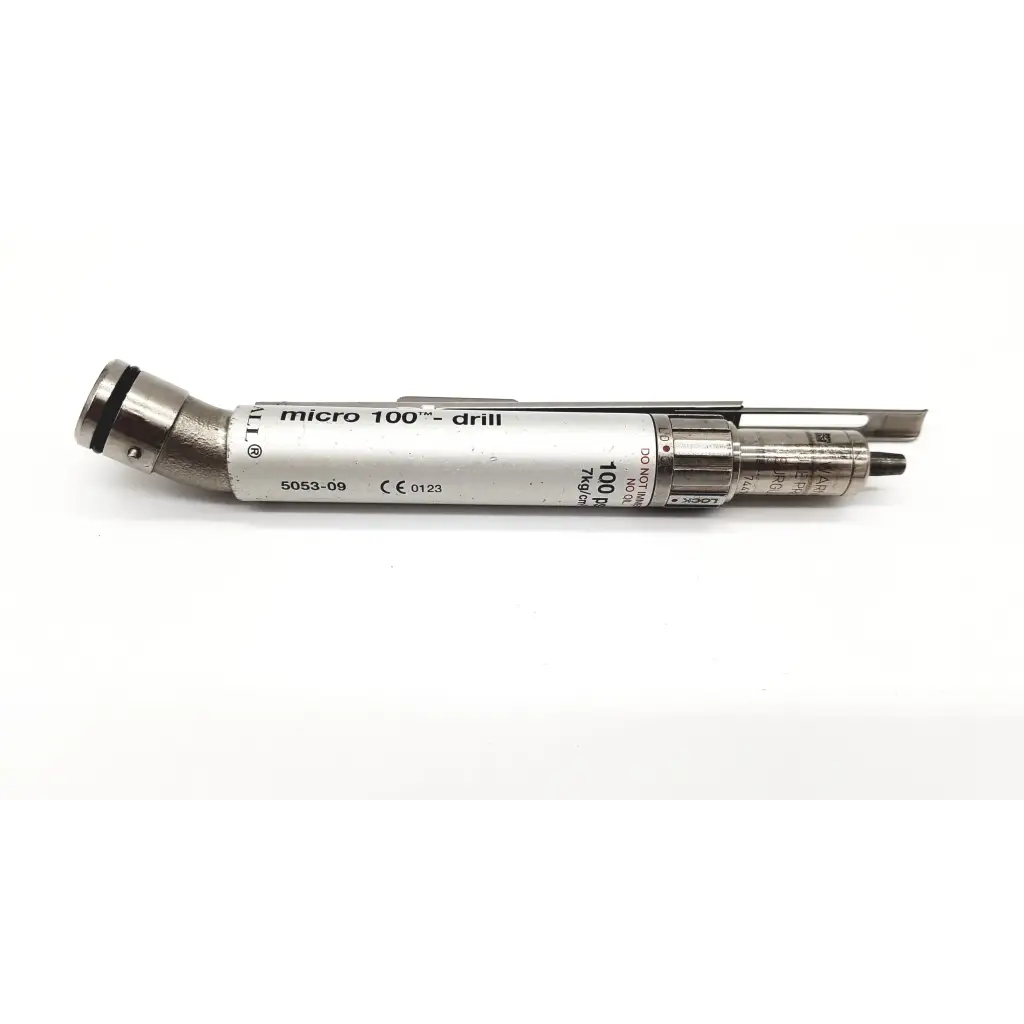 Silver metallic zimmer hall micro 100 drill medical instrument with cylindrical body and adjustable chuck mechanism