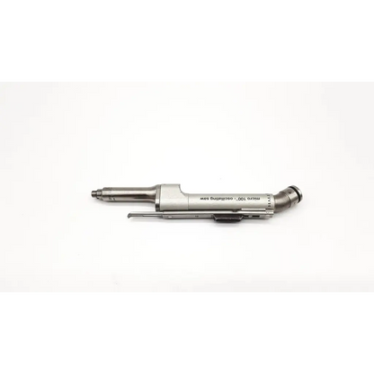 Silver zimmer hall micro 100 oscillating saw with sleek metallic body and precise engineering for surgical use