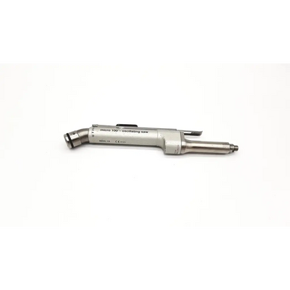 Silver metallic zimmer hall micro 100 oscillating saw with sleek cylindrical body and precision-engineered components