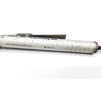 Silver-colored textured metal zimmer hall micro 100 reciprocating saw with black printed branding and model number