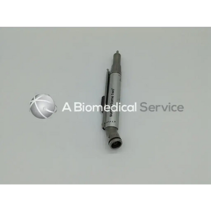 Silver metallic surgairtome two surgical instrument with cylindrical body and threaded ends in zimmer linvatec hall set