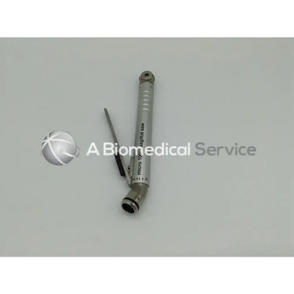 Silver metallic micro 10mm sagittal saw with sleek cylindrical body in zimmer linvatec hall micro 100 pneumatic set with surgairtome two