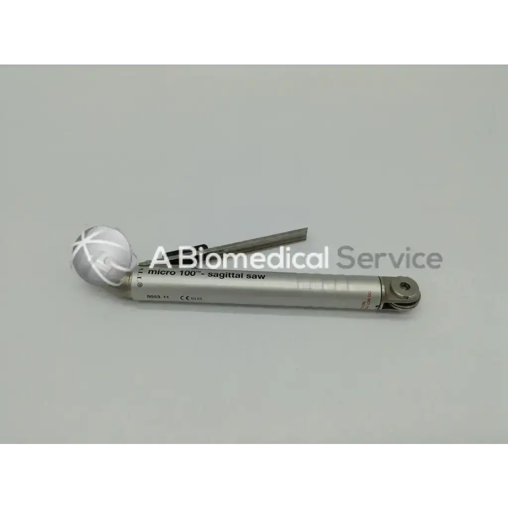 Silver-colored micro 100 sagittal saw with spherical handle and metallic blade from zimmer linvatec hall surgairtome two set