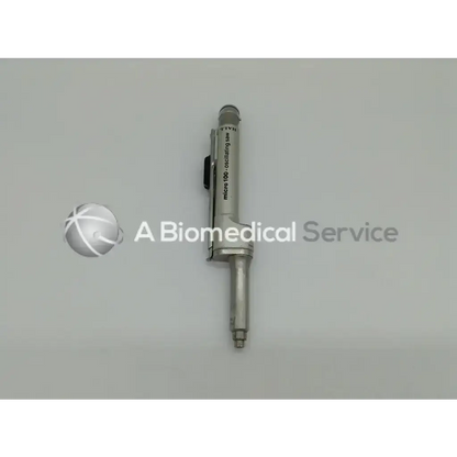 Silver metallic zimmer linvatec hall micro 100 oscillating saw with black grips in surgairtome two pneumatic set