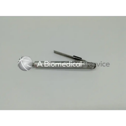 Silver metallic zimmer linvatec hall micro 100 pneumatic surgairtome two instrument with spherical end and engraved text