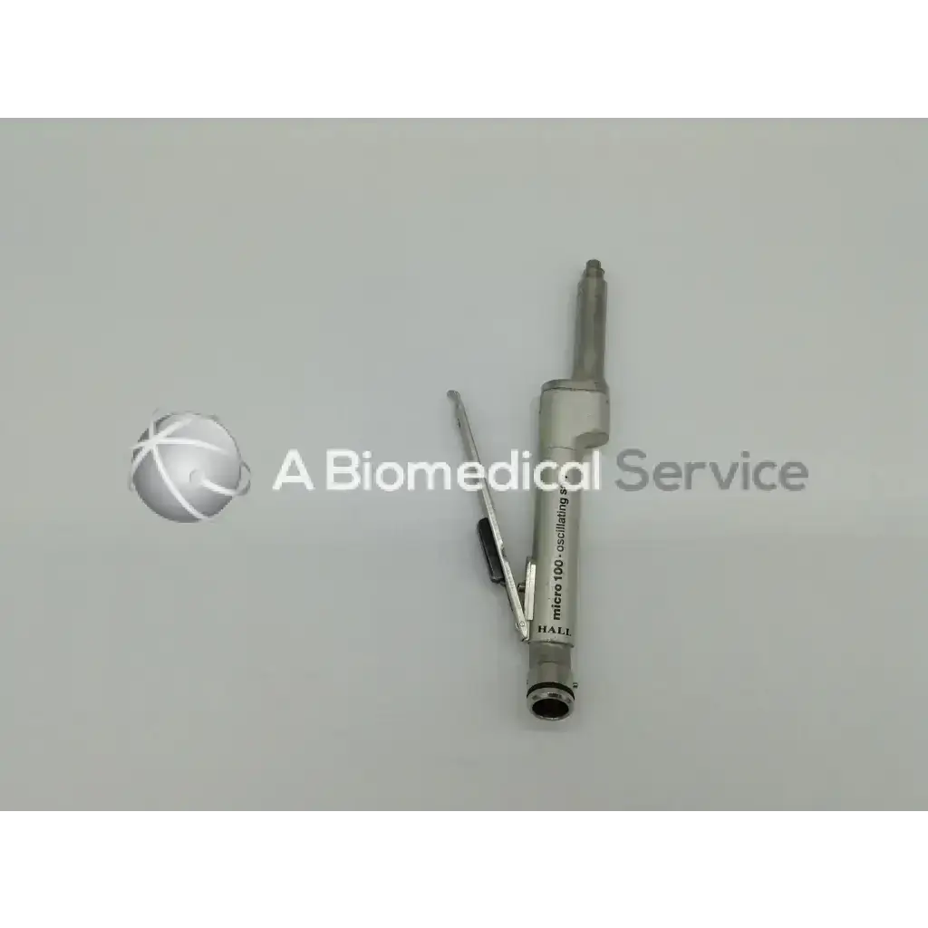 Silver metallic micro 100 oscillating saw with articulated arm from zimmer linvatec hall surgairtome two set