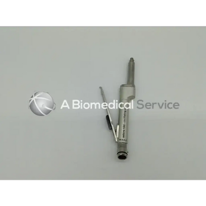 Silver metallic micro 100 oscillating saw with articulated arm from zimmer linvatec hall surgairtome two set