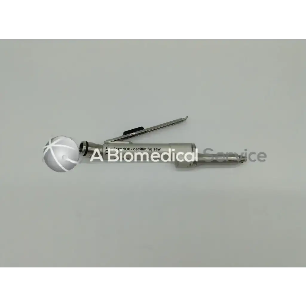 Silver metallic zimmer linvatec hall oscillating saw with spherical handle white crosshatch and black grip for surgairtome two