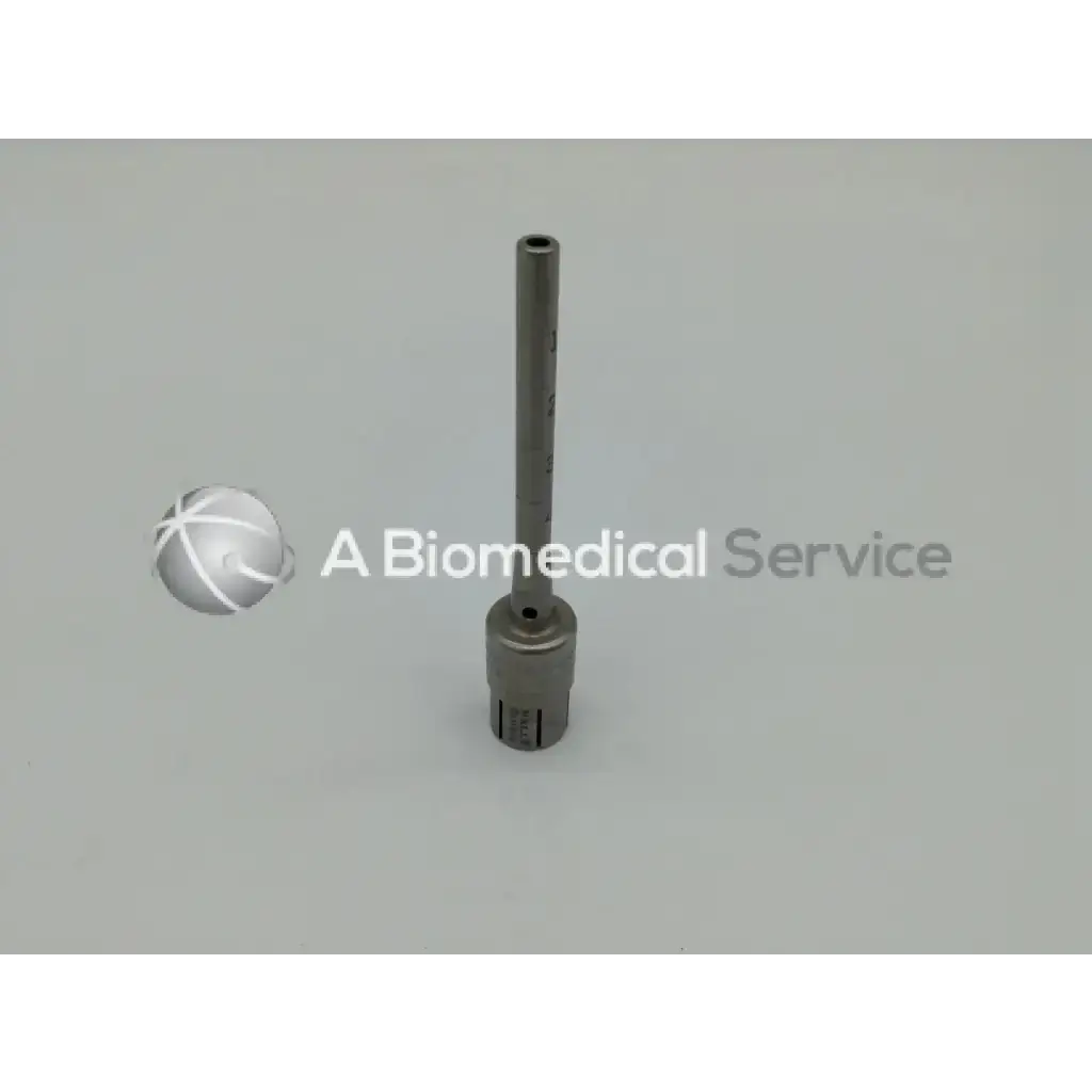 A sleek metallic surgairtome two with cylindrical shaft and threaded base from zimmer linvatec hall micro 100 set