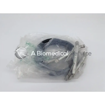 Silver surgical instrument set in clear plastic packaging for zimmer linvatec hall micro 100 pneumatic surgairtome two