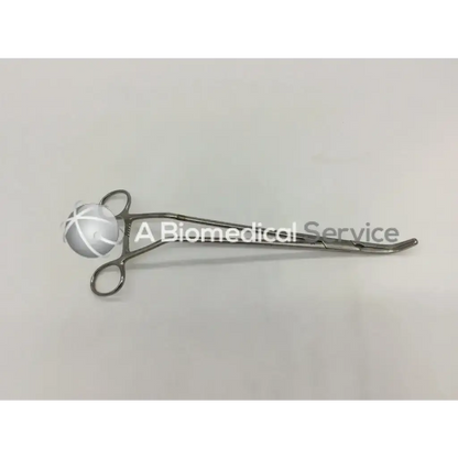 Silver surgical clamp angled offset forceps with textured spherical grip and angled offset handle for precision use