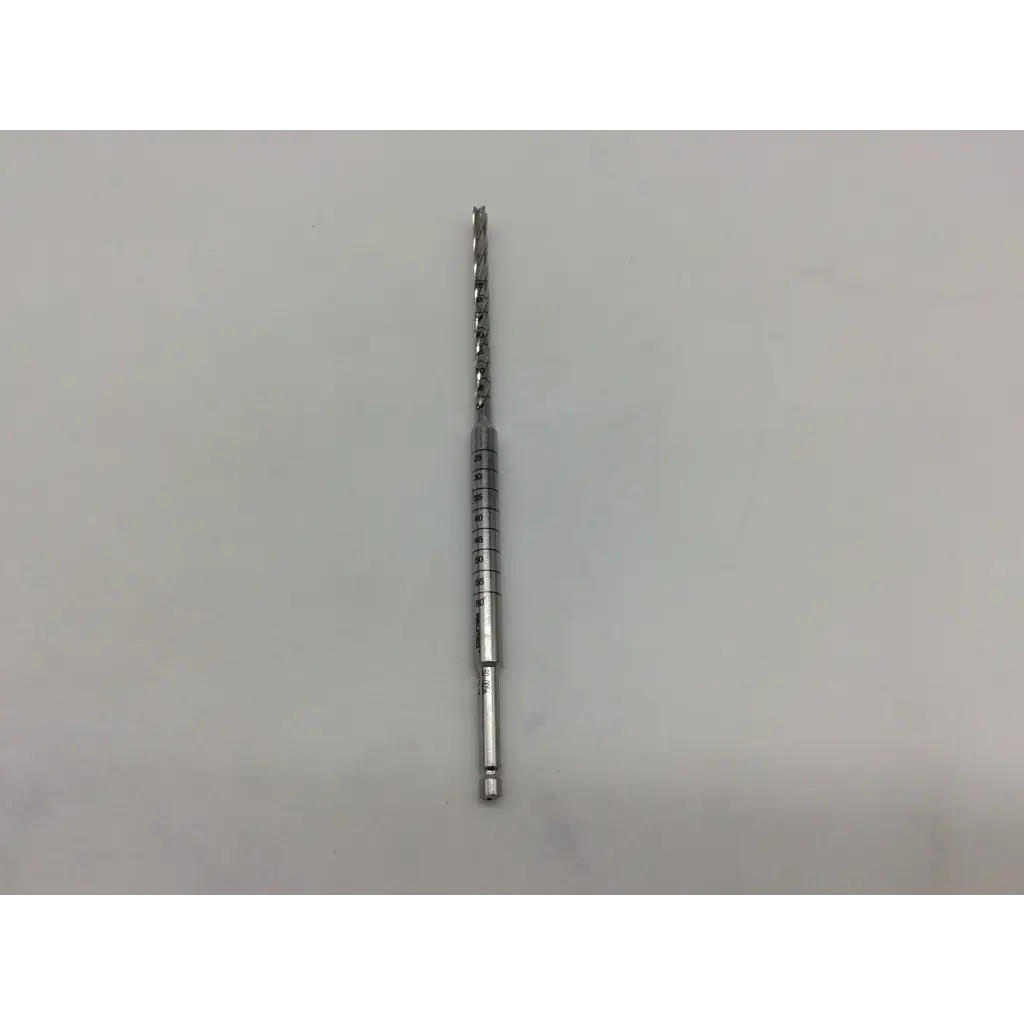 Silver metal acutrack cannulated long drill bit with spiral flute and measurement markings on shaft acumed 80-0056