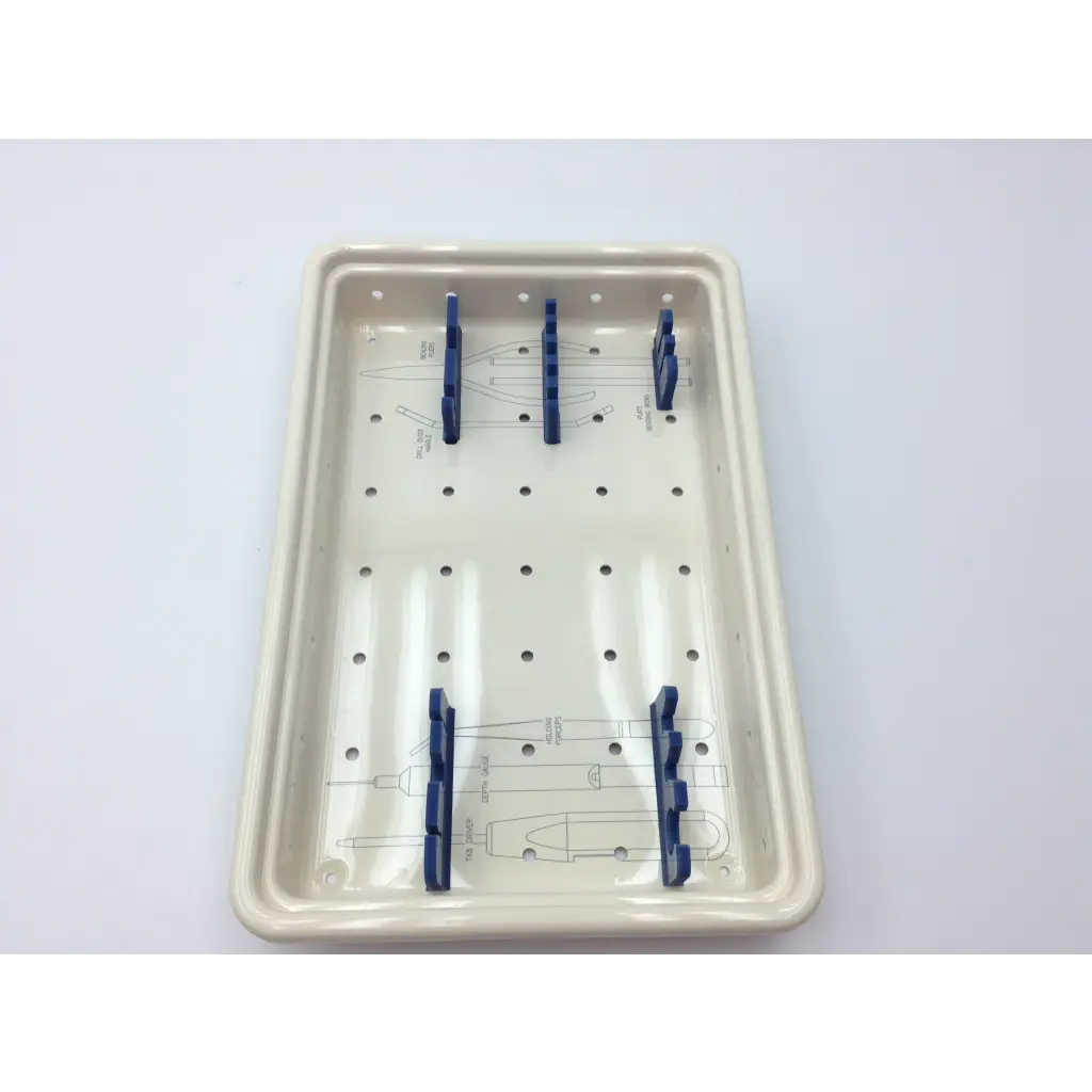 Cream-colored ceramic surgical instrument tray with blue holders in ascension forefoot set csa-800-01 forefoot set