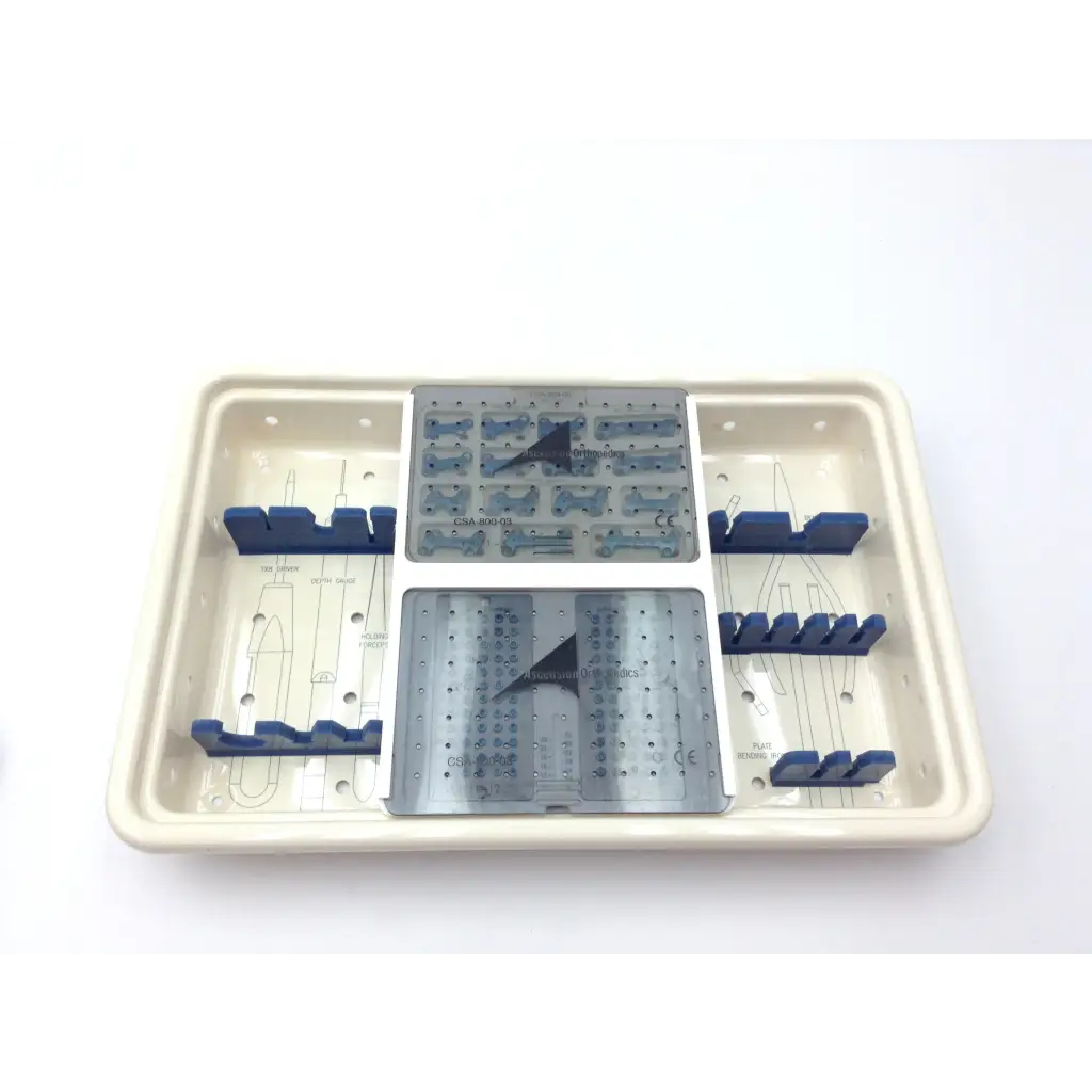 Beige plastic surgical instrument tray with gray metal plates and blue holders in the ascension forefoot set csa-800-01 set