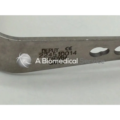 Silver metallic depuy 224510014 surgical retractor small with engraved markings and circular cutouts
