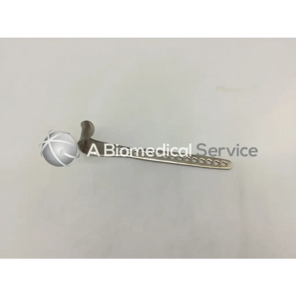 Depuy 224510014 surgical retractor small with silver textured handle and slender blade featuring circular cutouts