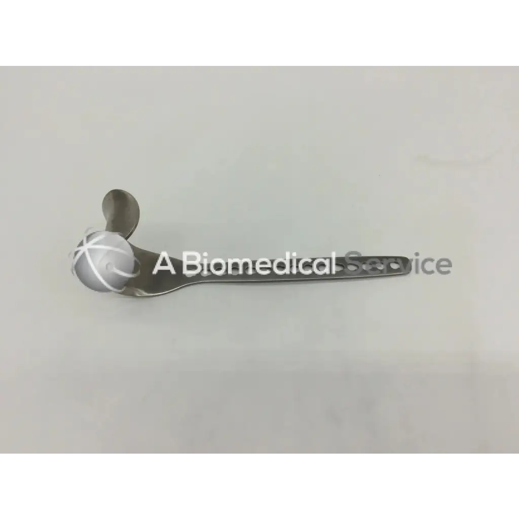 Depuy 224510015 surgical retractor silver metallic with spherical head engraved cross pattern and slender handle